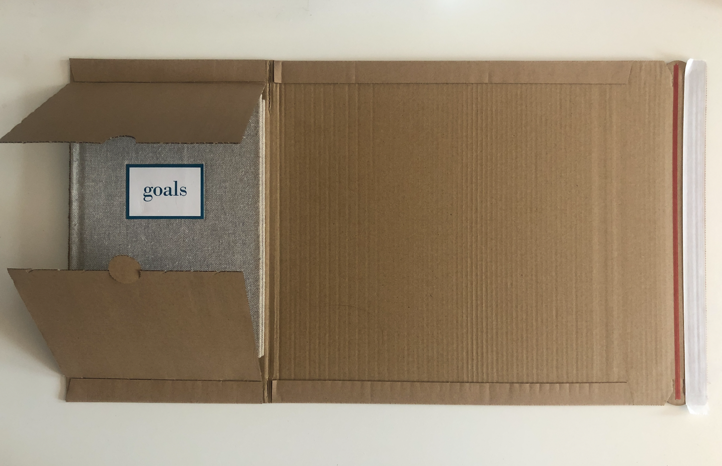 BWR05 325 x 250 x (20-75) Reusable Book Wrap Brown 400gsm corrugated board Peel & Seal